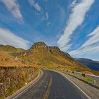 curving mountain highway in summer